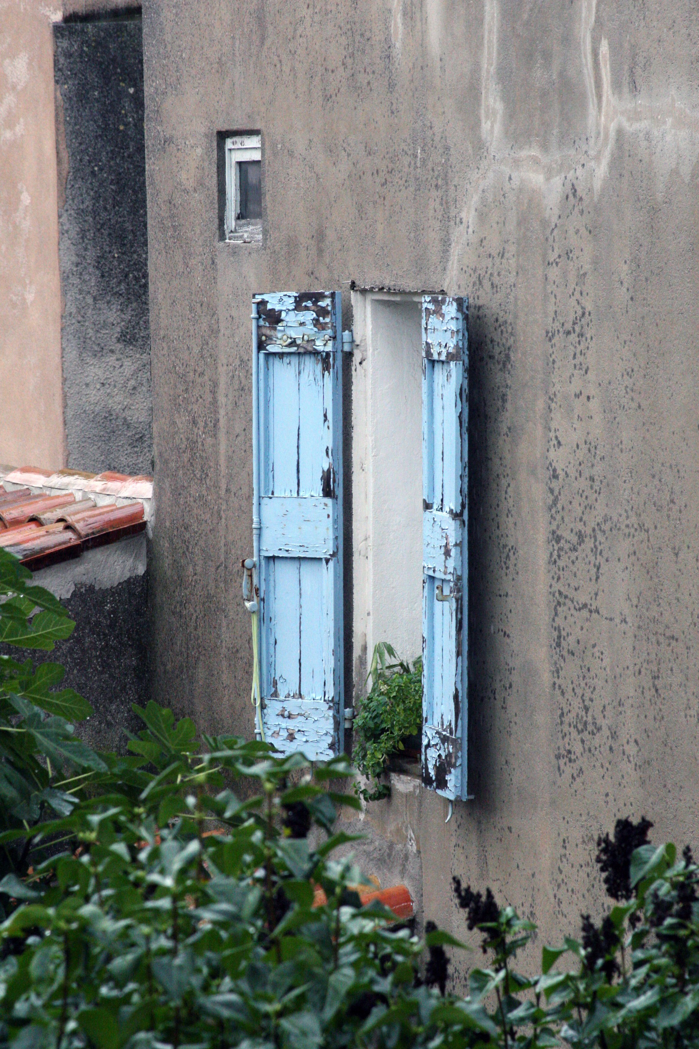 French village and blue shutters French village and blue shutters