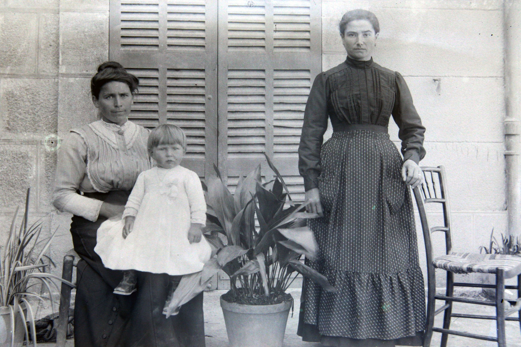 antique photographs on glass slides Two-women-and-a-child antique photographs on glass slides Two-women-and-a-child