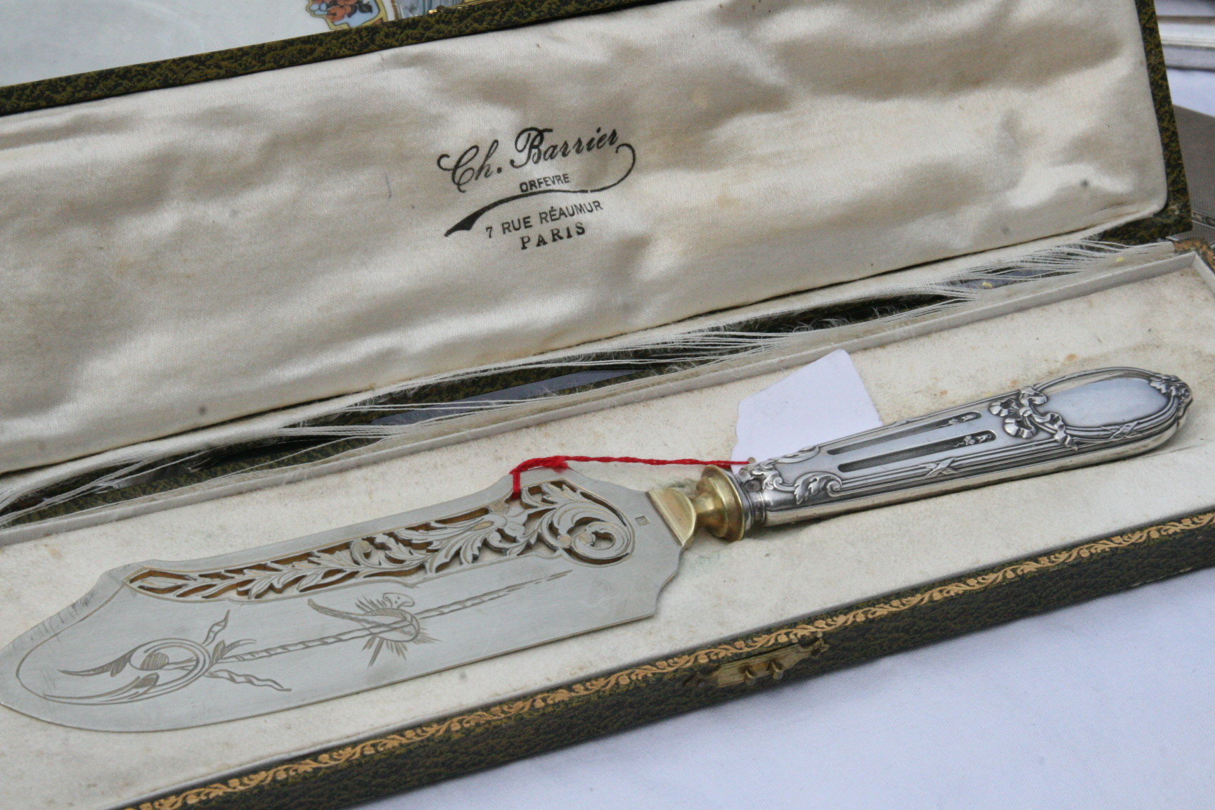 silver ice cream knife