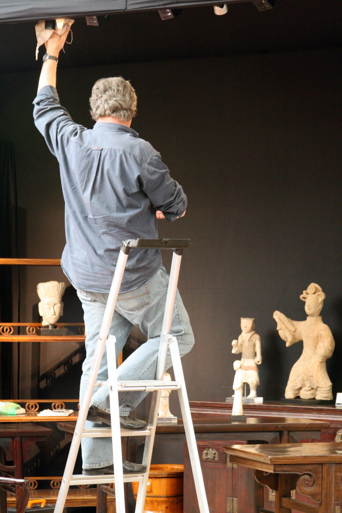 Standing on a ladder