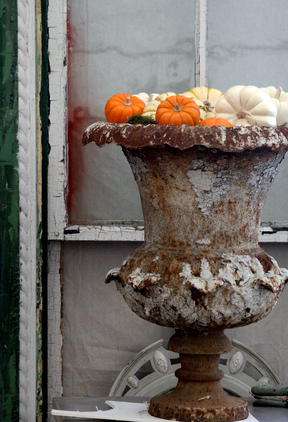 French antique urn with fall foilage