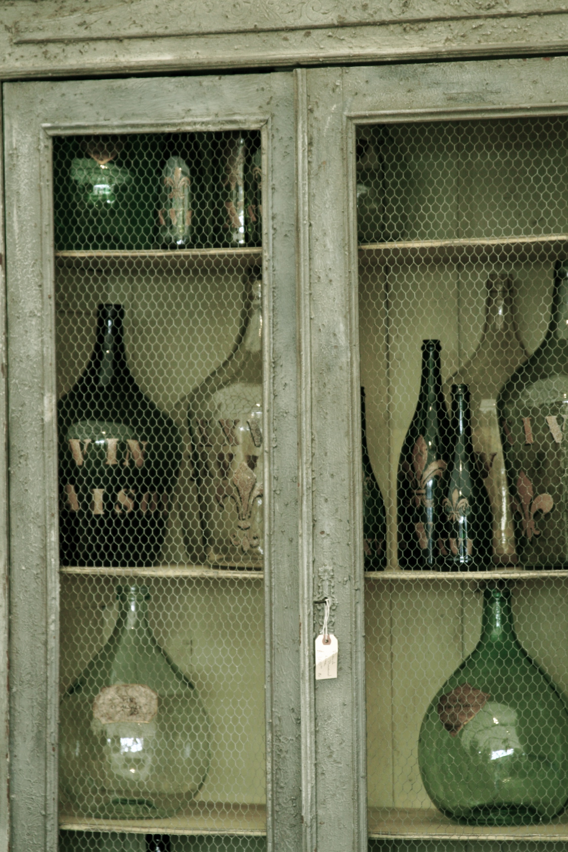wine bottles in cupboard wine bottles in cupboard