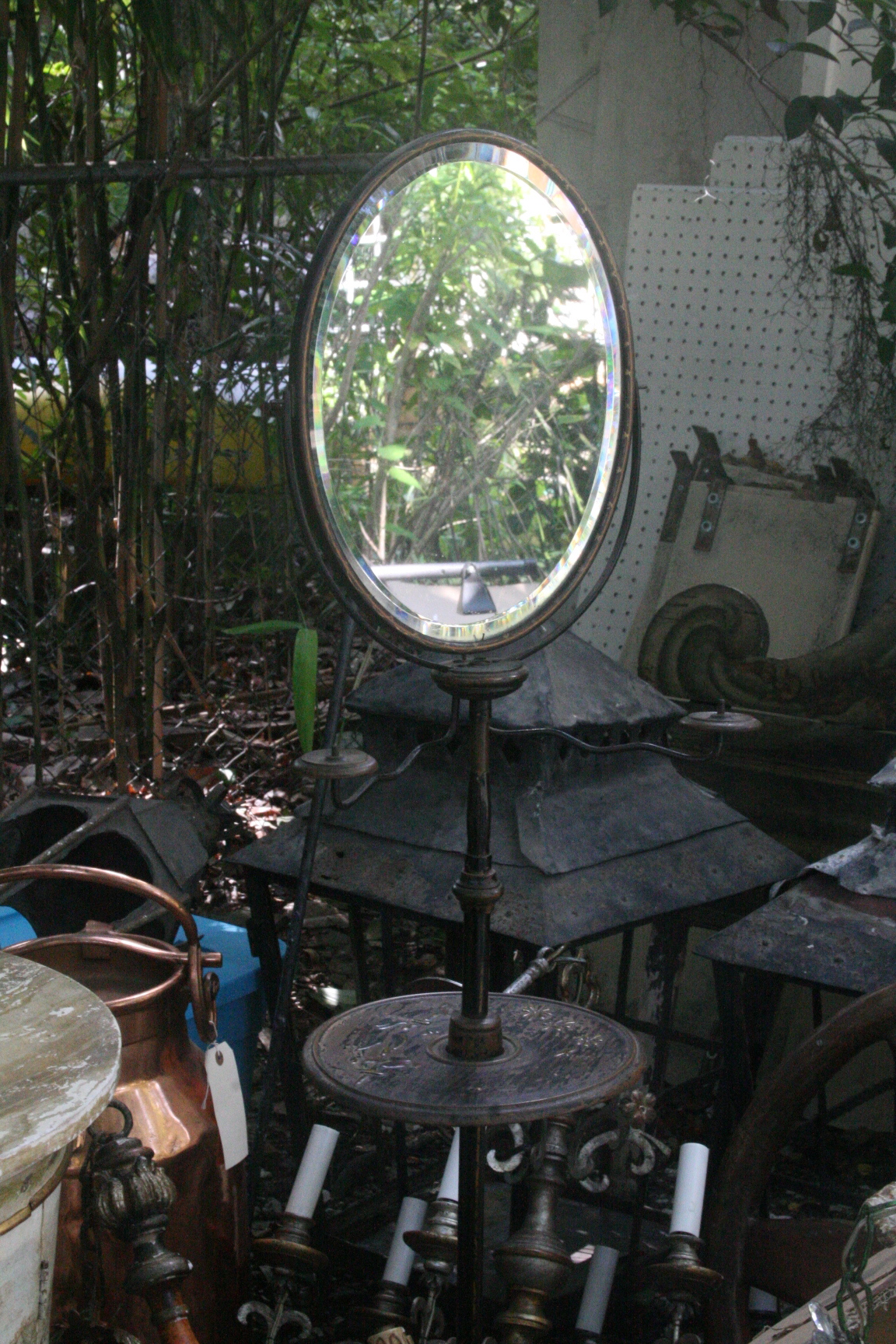 A mirror stand for a gentleman's shaving