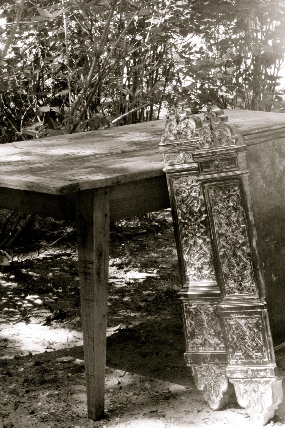 farm table and iron bed