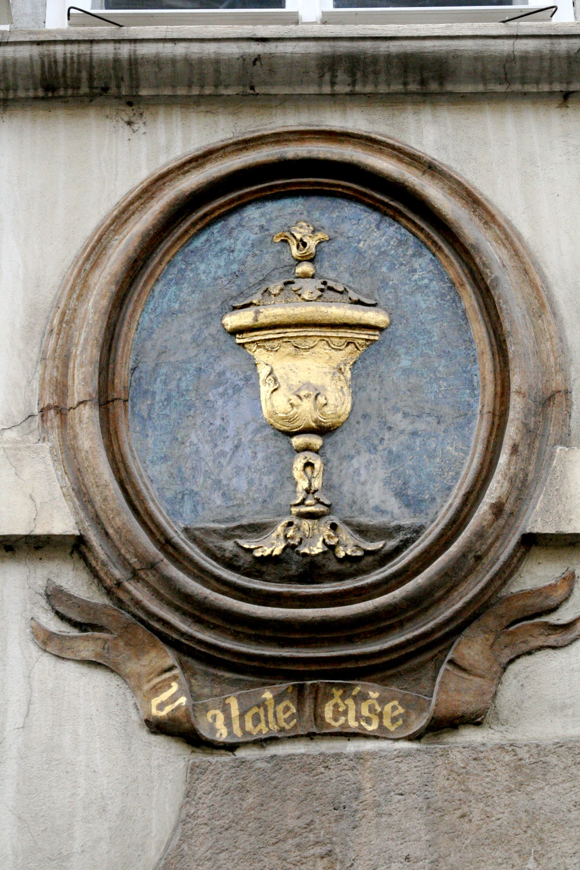 Chalice above doorway in Prague Chalice above doorway in Prague