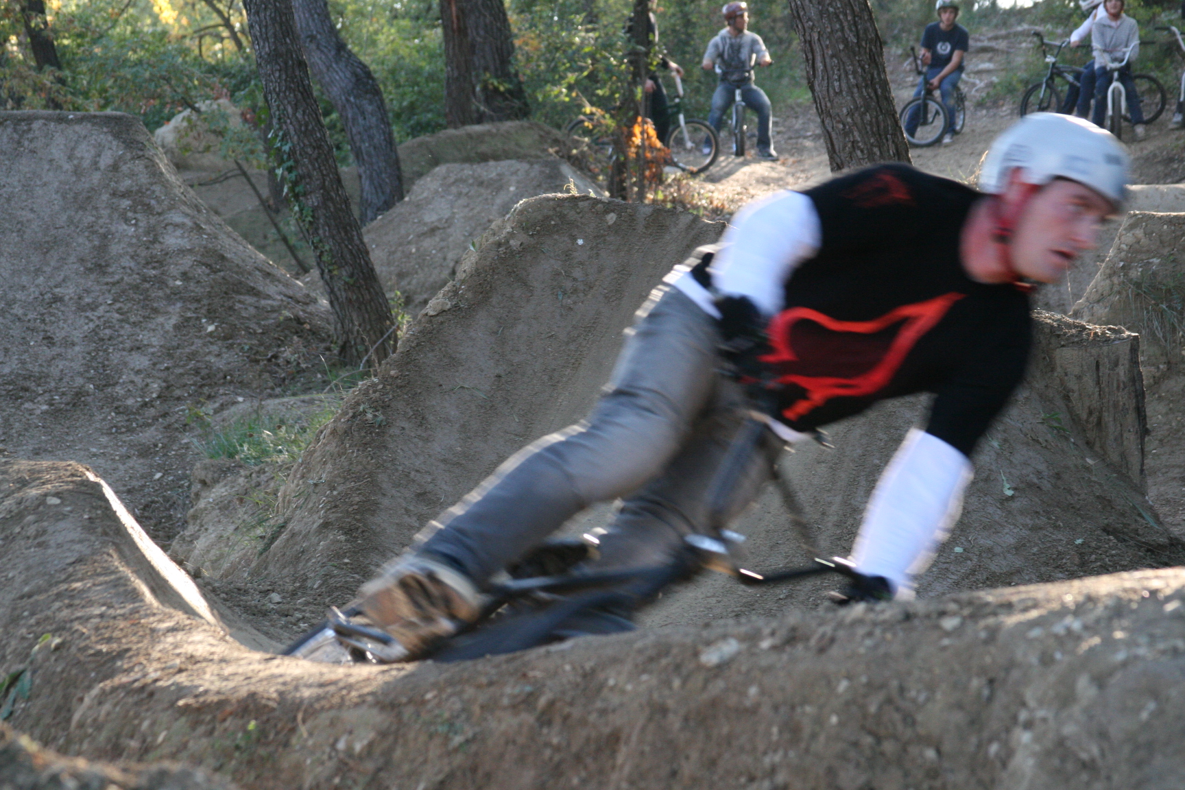 building up speed BMX dirt trail