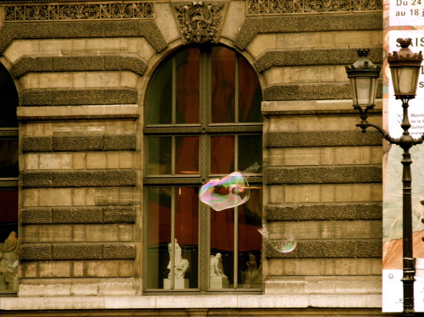 bubble floating by the Louvre bubble floating by the Louvre