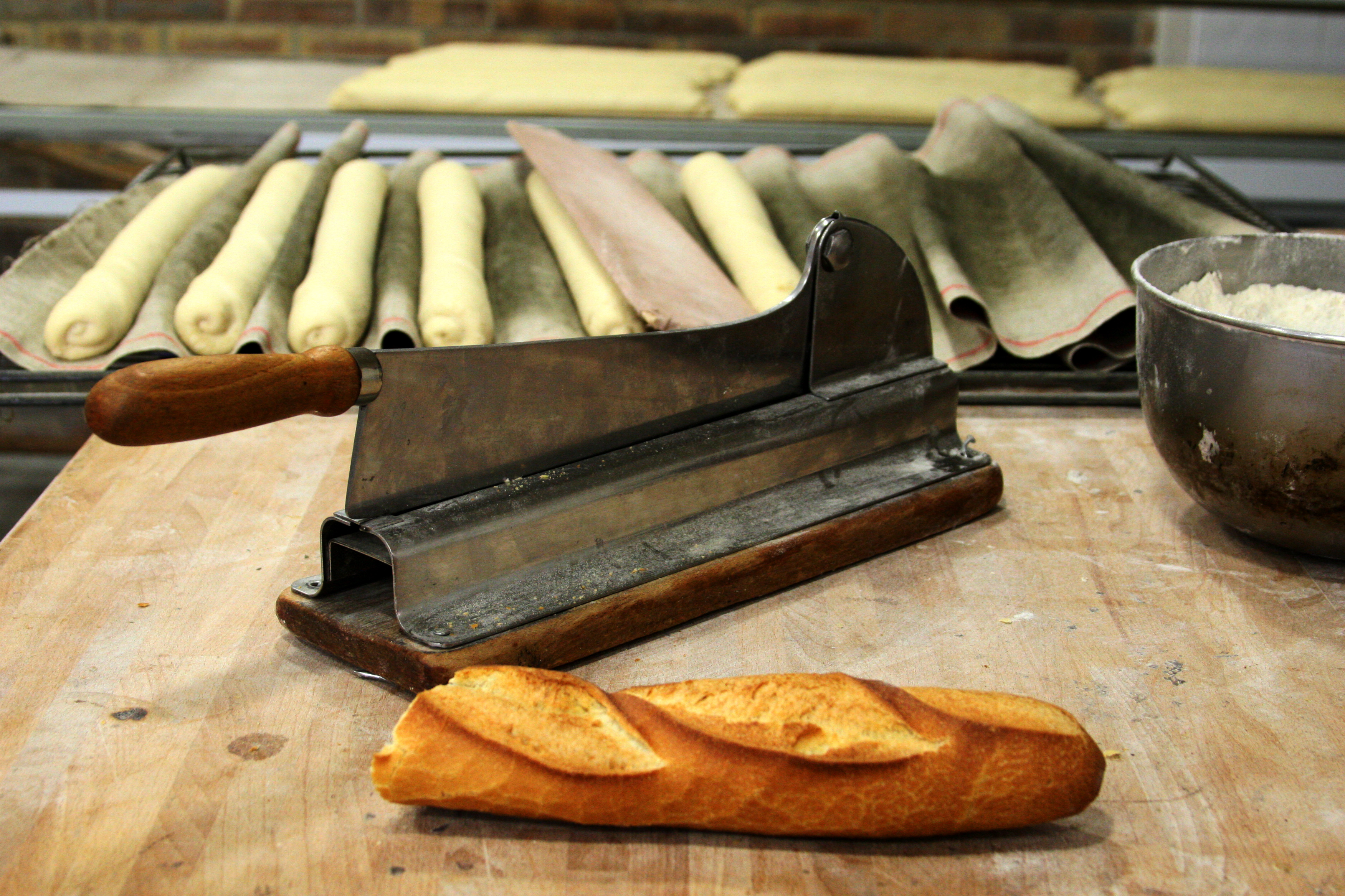 French bread cutter, at the bakery in France