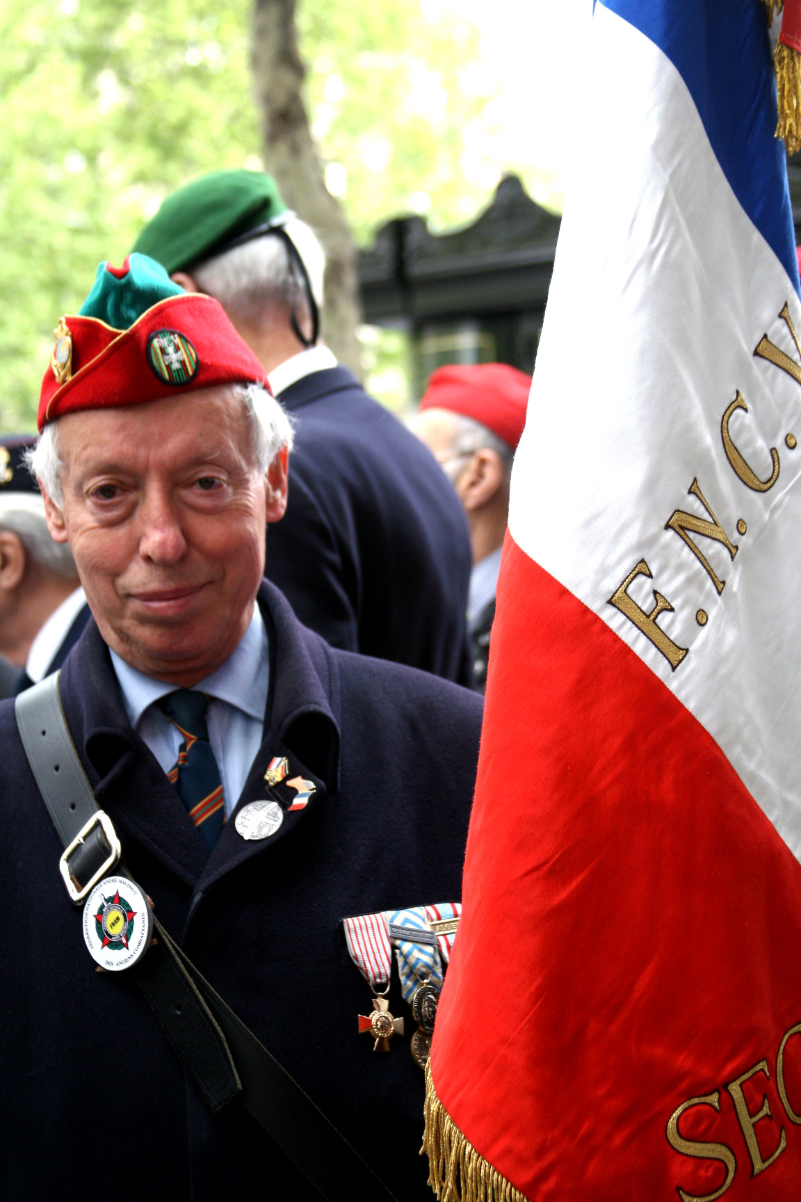 Veteran-with-flag veteran's day in paris