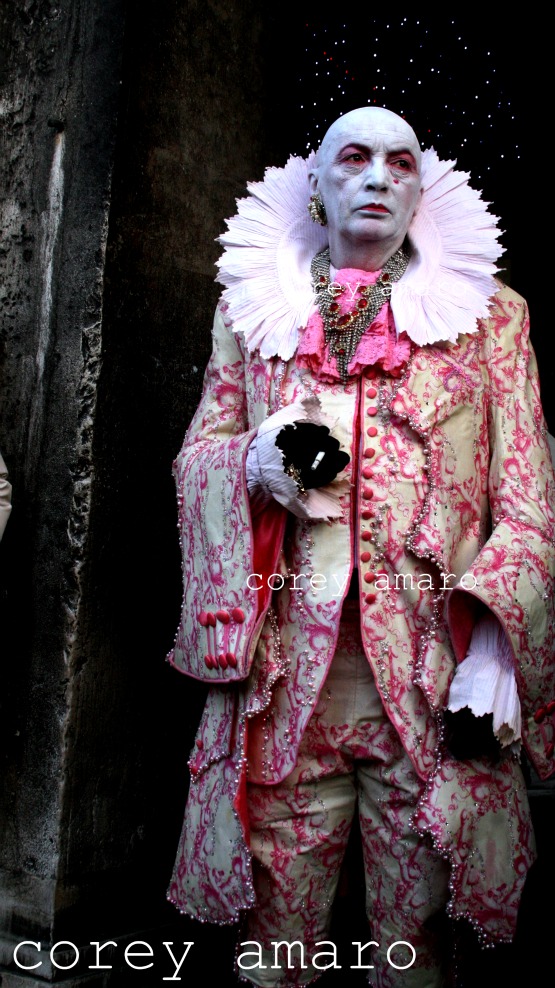 Man in pink venice carnival