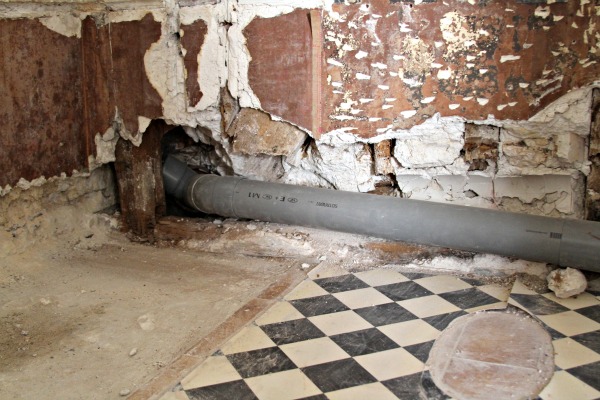 Plumbing in old stone wall Plumbing in old stone wall