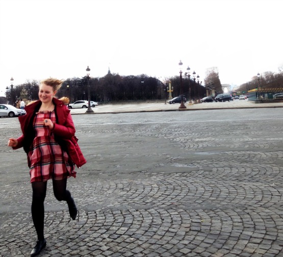 Running across the place de la concorde in paris 2014