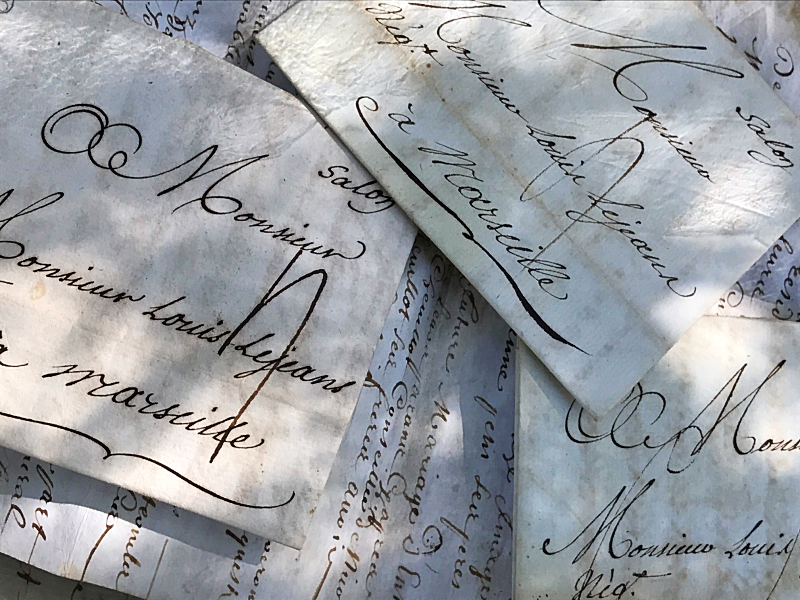 french script antique paper