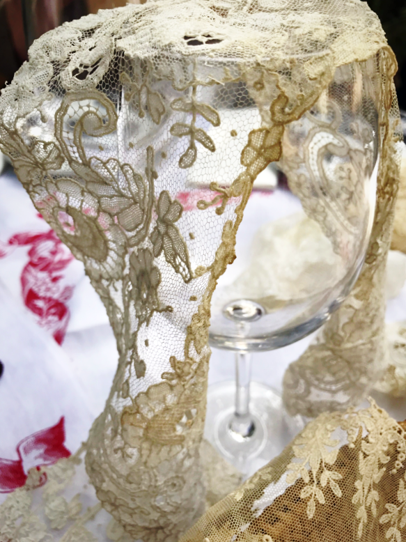 piece of lace glass of wine