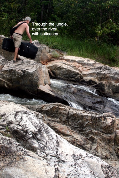 Crossing river with suitcases Crossing river with suitcases