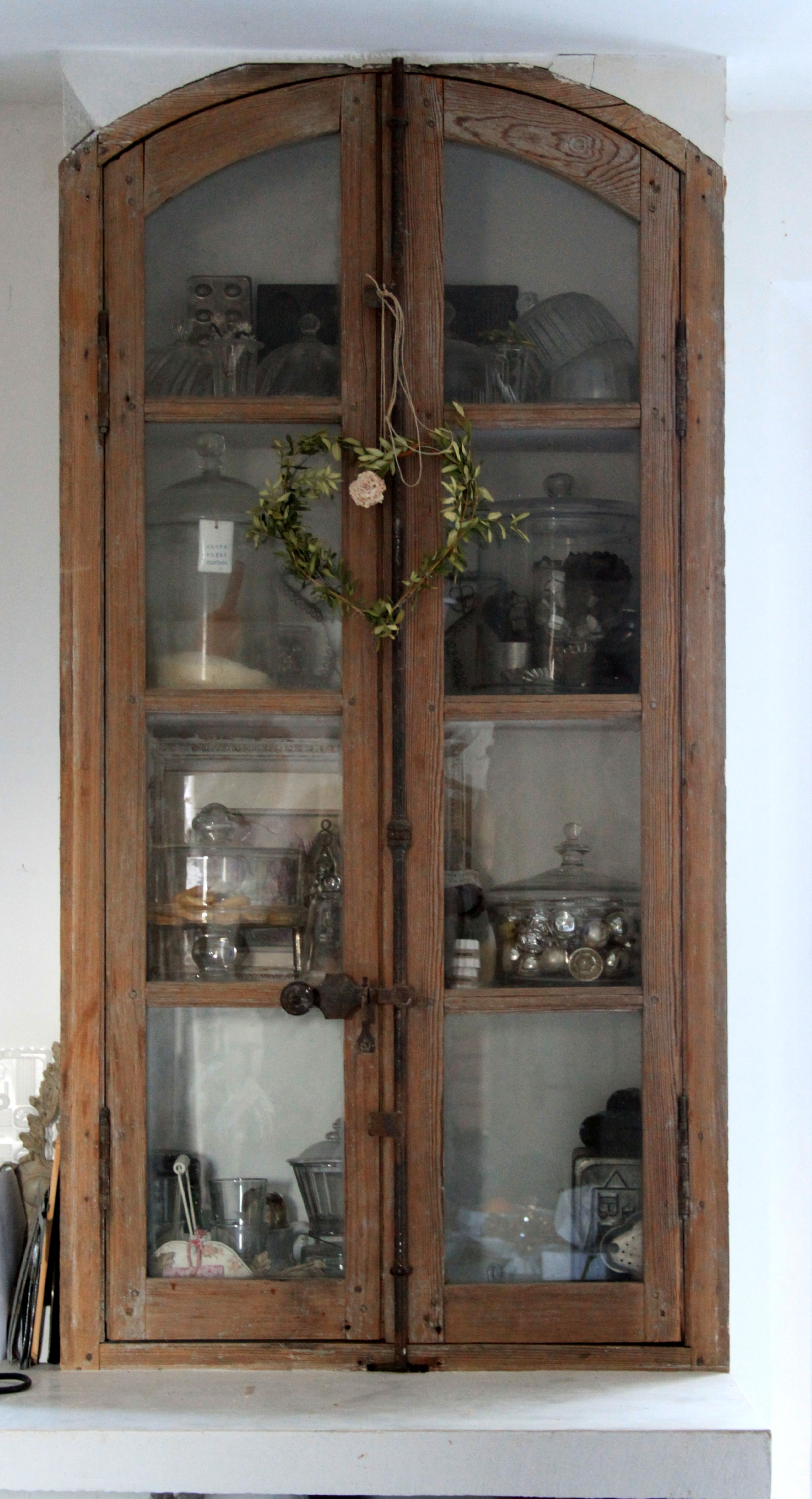 Ma maison window frames used as cupboard doors Ma maison window frames used as cupboard doors