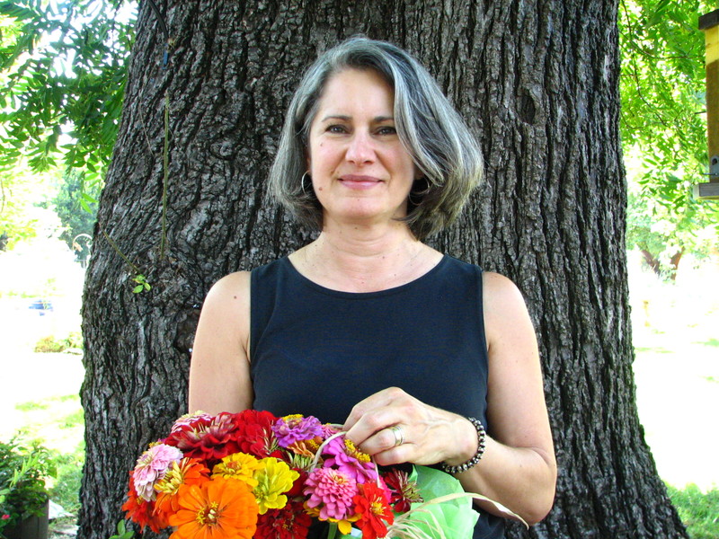 standing by an oak tree